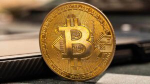 Standard Chartered Softens Bitcoin Outlook as Momentum Slows